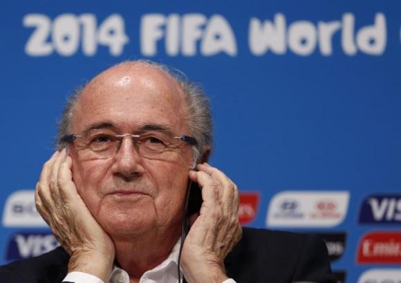 FIFA President Sepp Blatter attends a news conference at the Maracana stadium in Rio de Janeiro