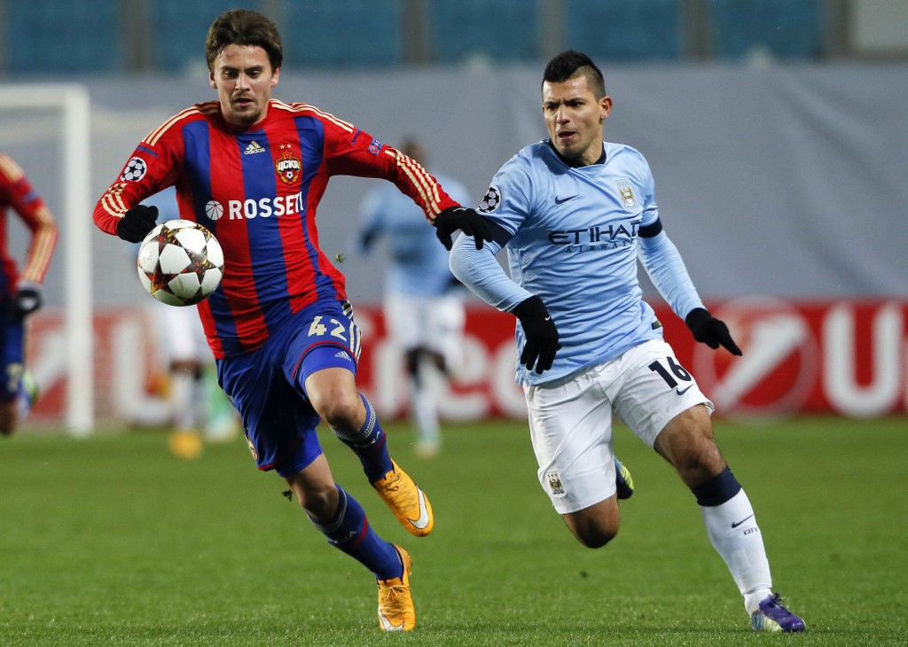 CSKA Moscow's Schennikov challenges Manchester City's Aguero during their Champions League Group E soccer match at the Arena Khimki outside Moscow
