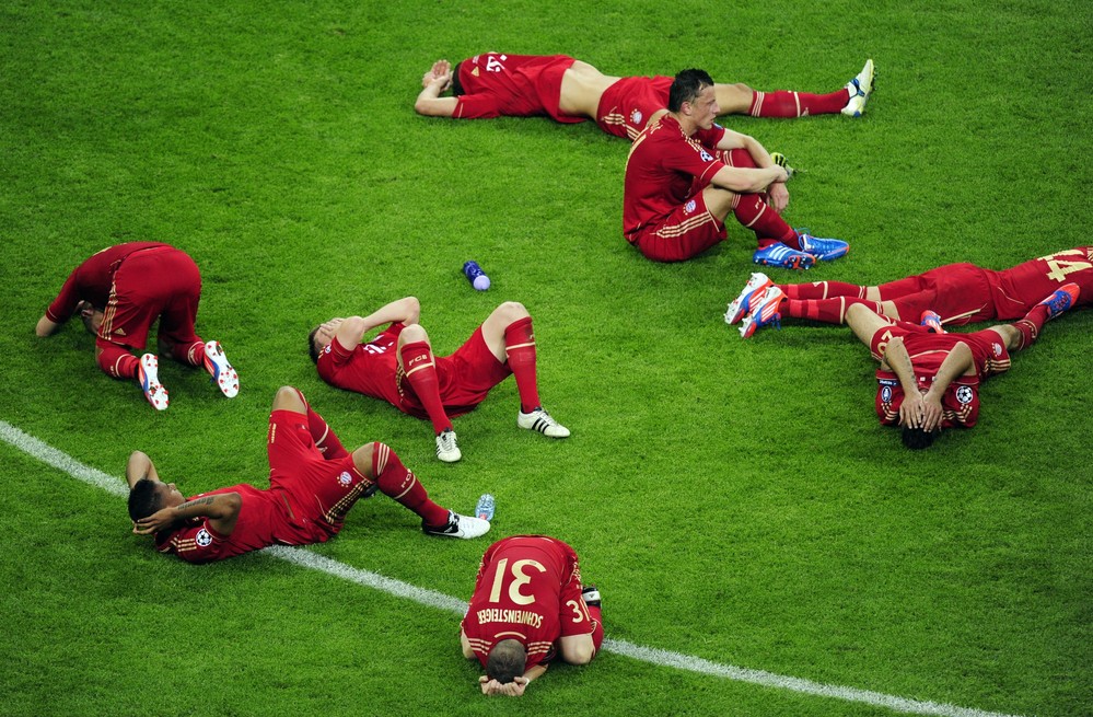 Players of Bayern Munich lay on the pitc