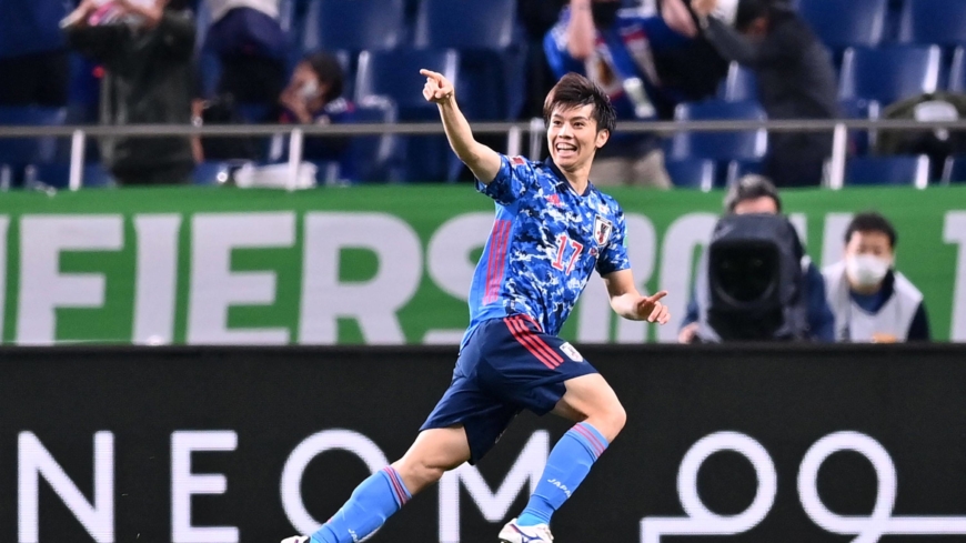 Japan's midfielder Ao Tanaka celebrates after scoring a goal during the 2022 Qatar World Cup Asian Qualifiers group B football match between Japan and Australia, at Saitama Stadium in Saitama, on October 12, 2021. (Photo by CHARLY TRIBALLEAU / AFP)